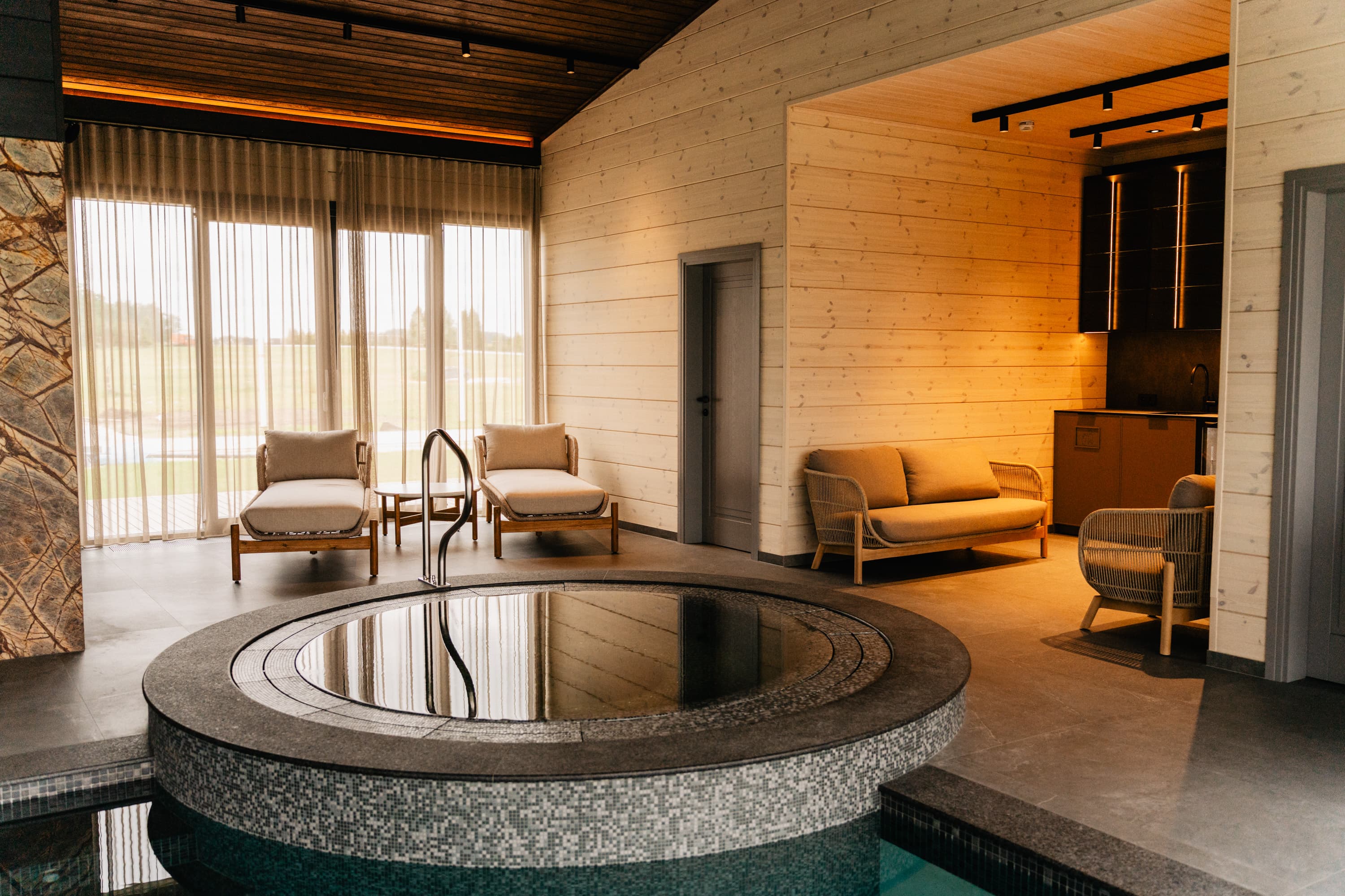 Relax & SPA interior with pool and lounge chairs